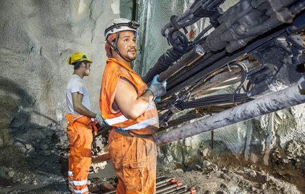 Miners on the drilling jumbo in Mules